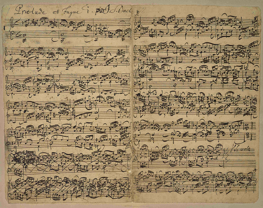 Handwritten musical score showing many notes, black ink on paper.